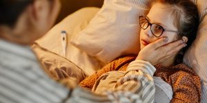 Mother Caring for Sick Daughter